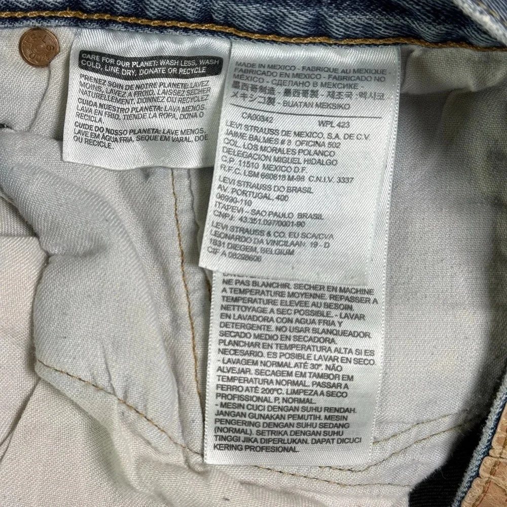 Levi's 501 Original Fit Men Jeans 44x32 Button Fly Straight Leg Light Wash Denim